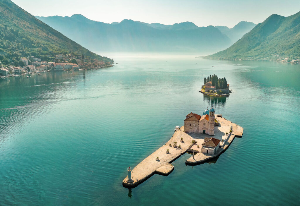 Aerial photo of St. George and monastery on the islands near Perast town in Kotor bay